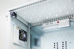 Industrial control cabinet with fan